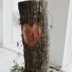 Pine cones, flowery hair, and forest chic combine at this rustic wedding