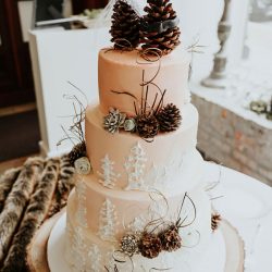 Pine cones, flowery hair, and forest chic combine at this rustic chic wedding