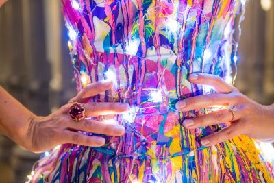 10687954 901994846479048 9174254787150414272 o - LEDs and rainbow paint make magic out of a simple white wedding dress This LED rainbow dress is a magical display of lights and color