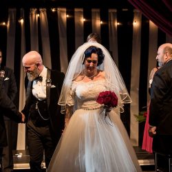 This wedding is like if David Lynch filmed The Addams Family ballroom scene