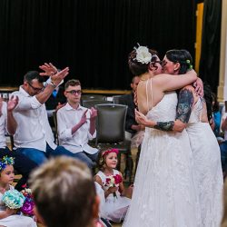 A whimsical polyamorous wedding joining two families in awesomeness