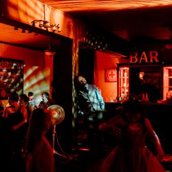 A dark & chic wedding with karaoke and Mexican meets Korean food