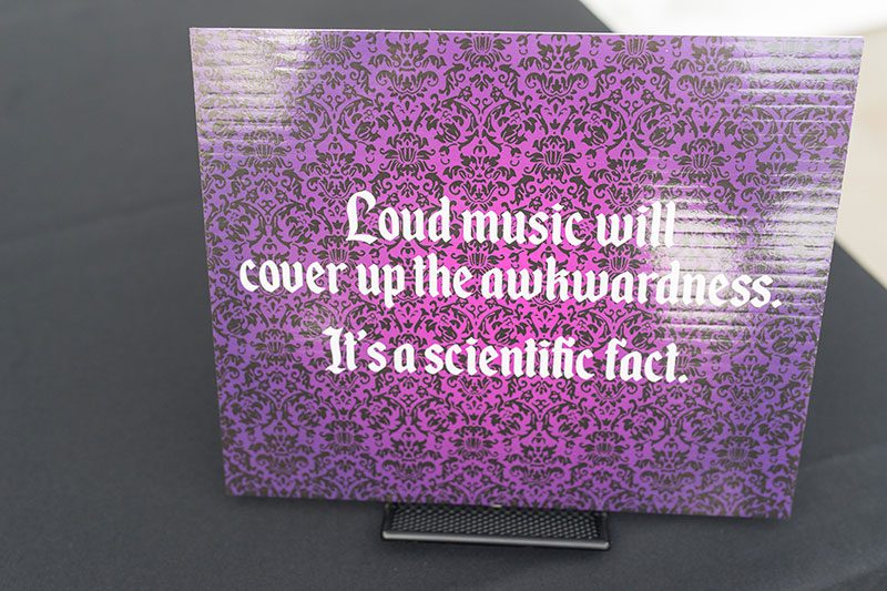 A goth meets nerd meets glam wedding with on-site ring tattoos