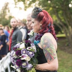 A goth meets nerd meets glam wedding with on-site ring tattoos