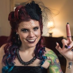 A goth meets nerd meets glam wedding with on-site ring tattoos