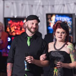 A goth meets nerd meets glam wedding with on-site ring tattoos