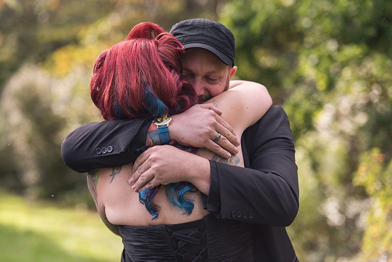 A goth meets nerd meets glam wedding with on-site ring tattoos