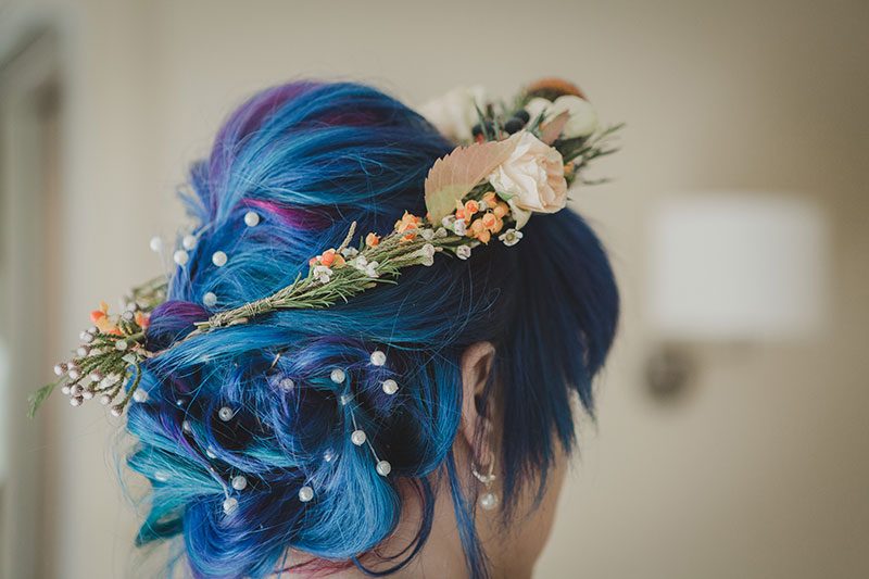 An Autumn witch lesbian wedding with tarot, tattoos, and beer