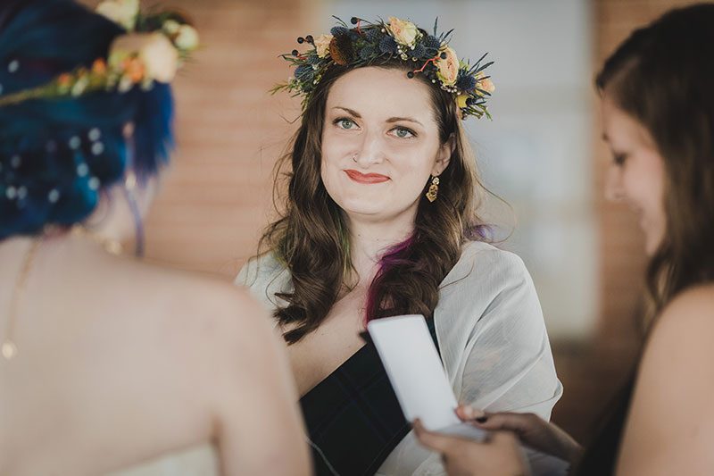 An Autumn witch lesbian wedding with tarot, tattoos, and beer