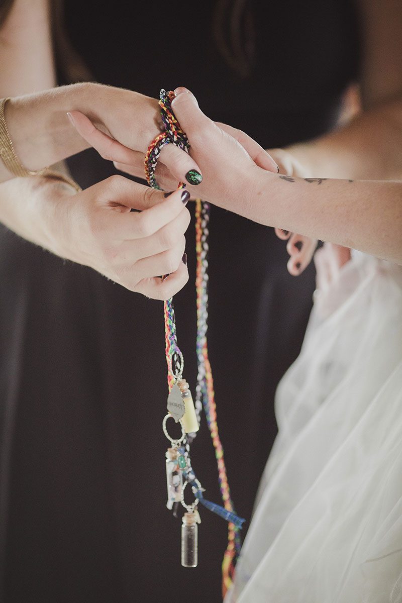 An Autumn witch lesbian wedding with tarot, tattoos, and beer