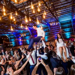 Flack Morgenroth SarahTewPhotography 0910RachelRobert1stDHoraSarahTewPhotography low - Wristbands, fireworks, lasers, & glow sticks at this musical fest inspired wedding Wristbands, fireworks, lasers, & glow sticks at this musical festival inspired wedding