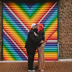 This rad pop-up wedding had glitter, sequins, and huge rainbow mural LOVE