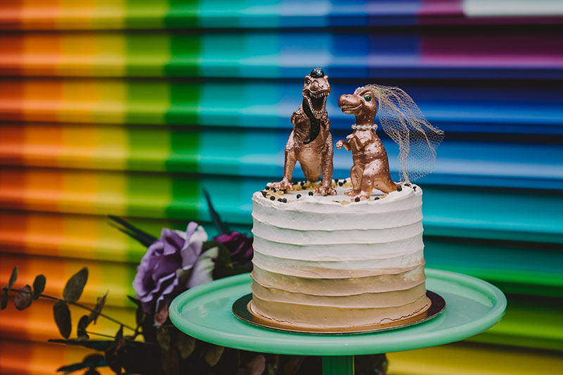 This rad pop-up wedding had glitter, sequins, and huge rainbow mural LOVE