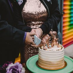 This rad pop-up wedding had glitter, sequins, and huge rainbow mural LOVE