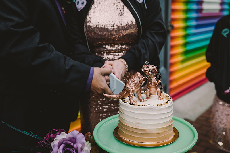 This rad pop-up wedding had glitter, sequins, and huge rainbow mural LOVE