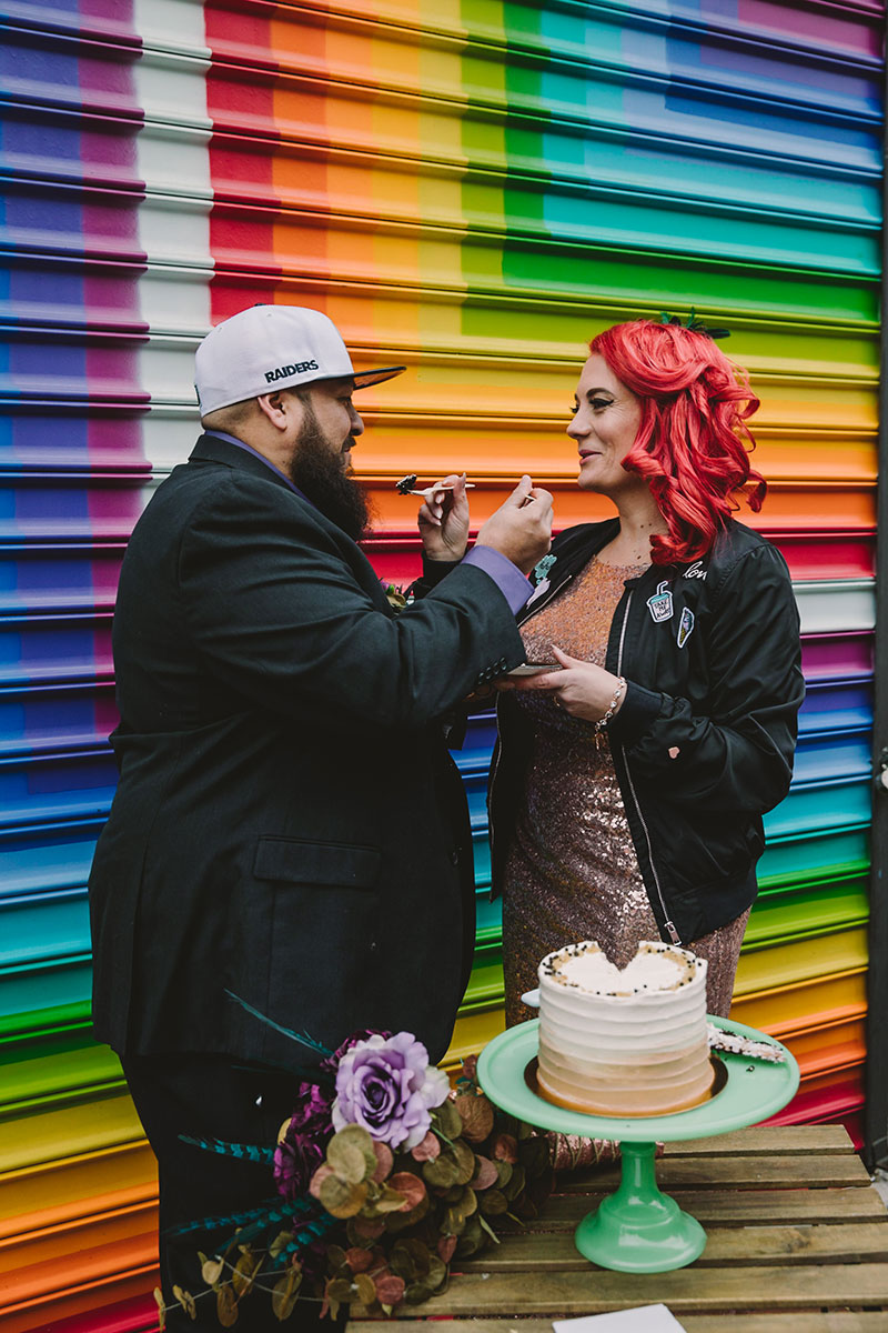 This rad pop-up wedding had glitter, sequins, and huge rainbow mural LOVE