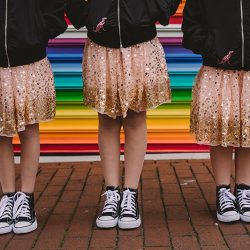 This rad pop-up wedding had glitter, sequins, and huge rainbow mural LOVE
