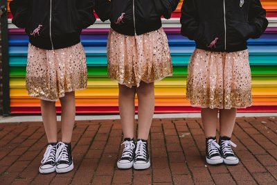 Photo Mar 17 11 21 02 AM - Approximately one bazillionty wedding dress code wording examples (some with dinosaurs!) This rad pop-up wedding had glitter, sequins, and huge rainbow mural LOVE