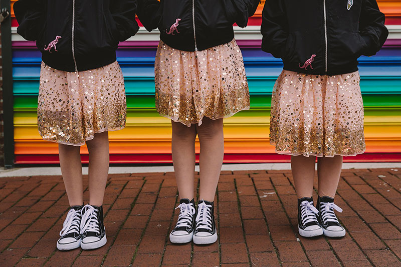 This rad pop-up wedding had glitter, sequins, and huge rainbow mural LOVE