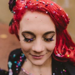 This rad pop-up wedding had glitter, sequins, and huge rainbow mural LOVE