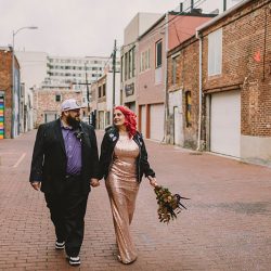 This rad pop-up wedding had glitter, sequins, and huge rainbow mural LOVE