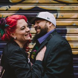 This rad pop-up wedding had glitter, sequins, and huge rainbow mural LOVE