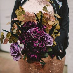 This rad pop-up wedding had glitter, sequins, and huge rainbow mural LOVE