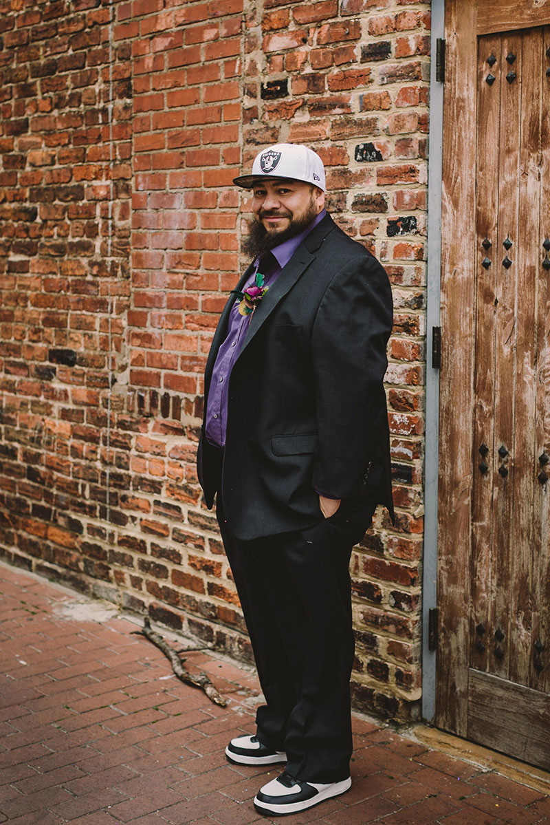 This rad pop-up wedding had glitter, sequins, and huge rainbow mural LOVE