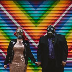 This rad pop-up wedding had glitter, sequins, and huge rainbow mural LOVE