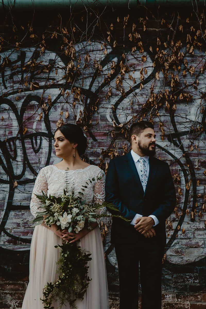 A stunningly moody Kentucky art gallery wedding with glowing details