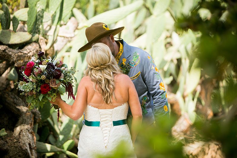 Tip a hat to this peacock, cowboys, and cacti wedding in San Diego