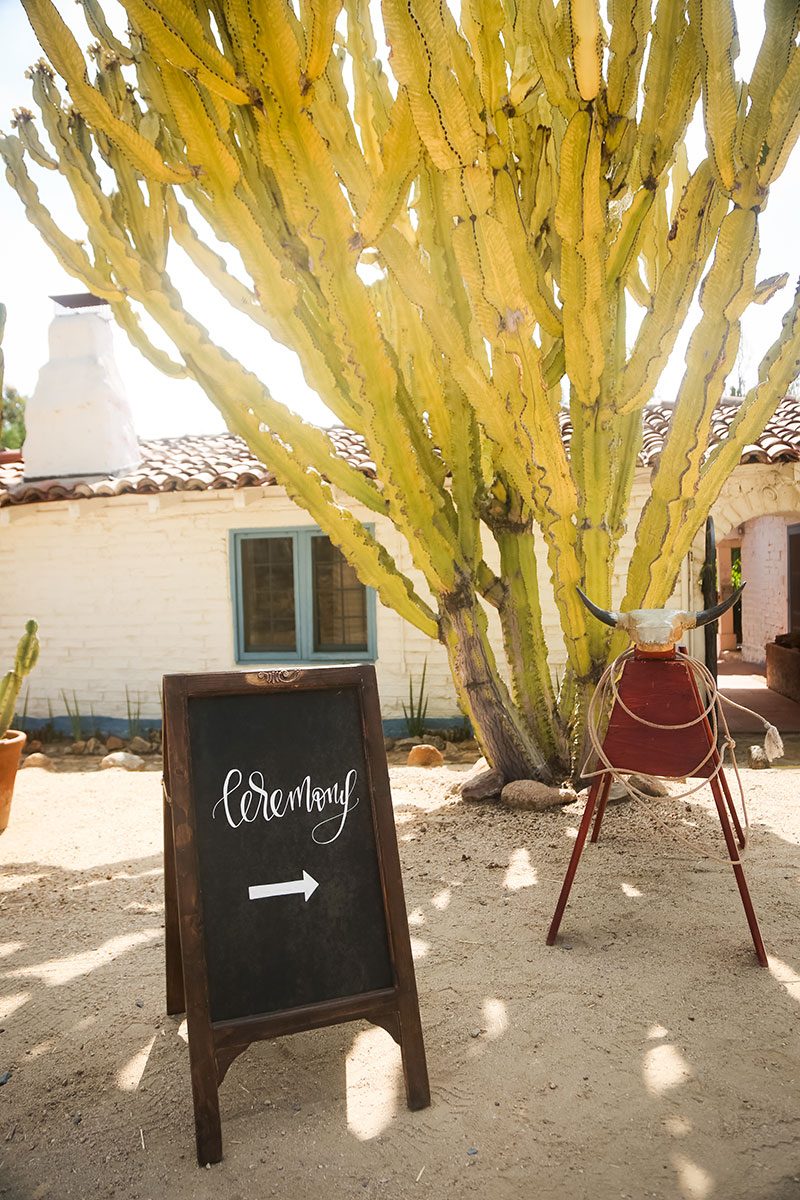 Tip a hat to this peacock, cowboys, and cacti wedding in San Diego