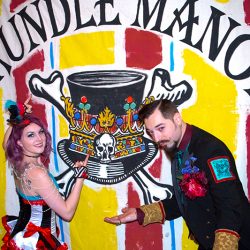 A fantastical villainous Candyland sideshow music fest wedding