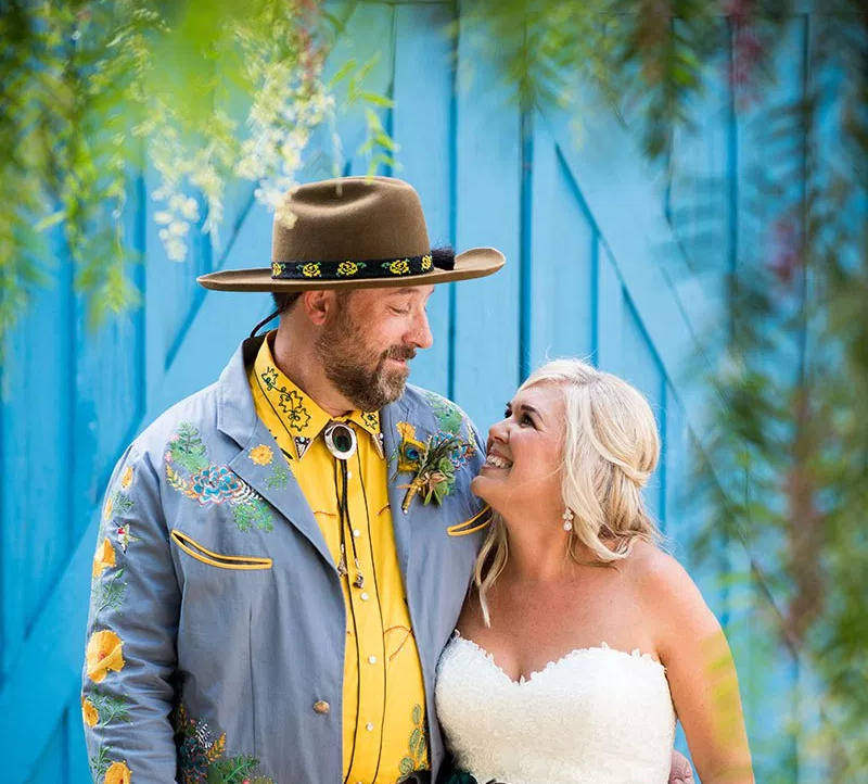 Tip a hat to this peacock, cowboys, and cacti wedding in San Diego