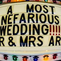 A fantastical villainous Candyland sideshow music fest wedding