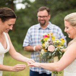 Two brides, a mountain view wedding, and cotton candy skies