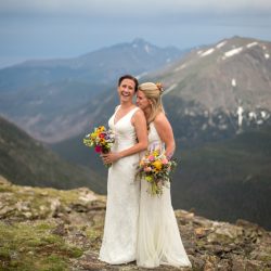 Two brides, a mountainside wedding, and cotton candy skies