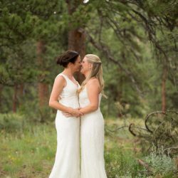 Two brides, a mountain view wedding, and cotton candy skies