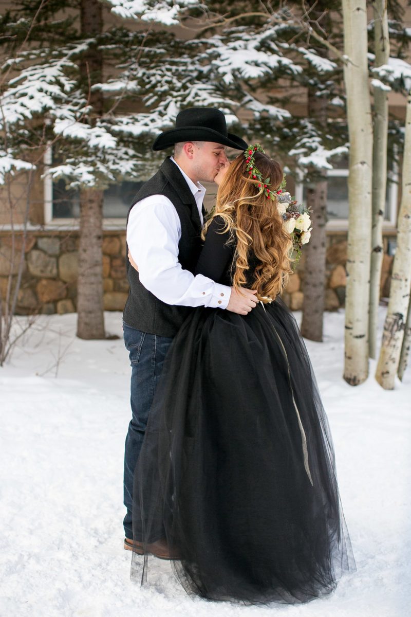 Don't miss the black gown and ski lift ride at this crisp winter elopement 