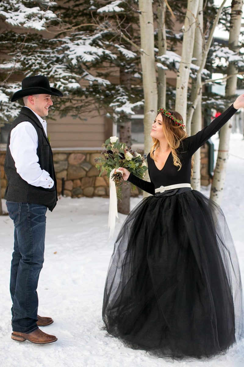 Don't miss the black gown and ski lift ride at this crisp winter elopement 