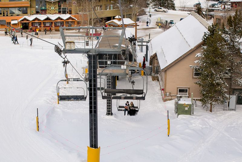Don't miss the black gown and ski lift ride at this crisp winter elopement 