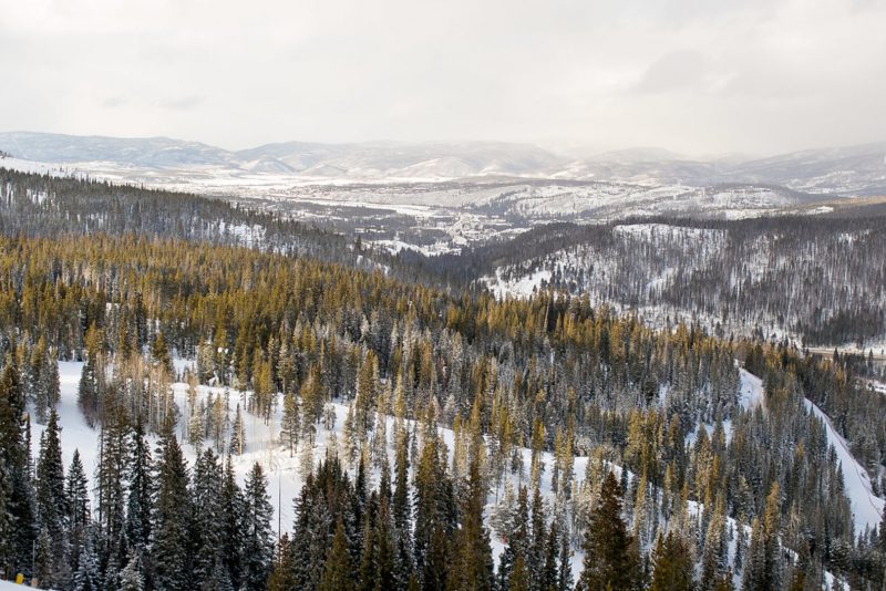 Don't miss the black gown and ski lift ride at this crisp winter elopement 