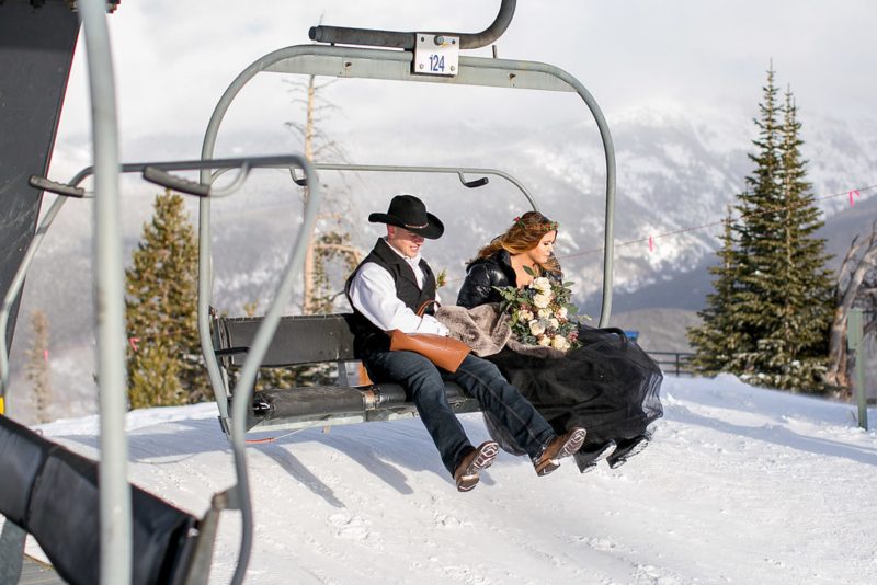Don't miss the black gown and ski lift ride at this crisp winter elopement 
