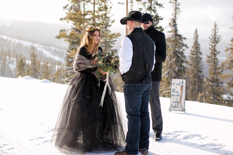Don't miss the black gown and ski lift ride at this chilly wintry elopement 