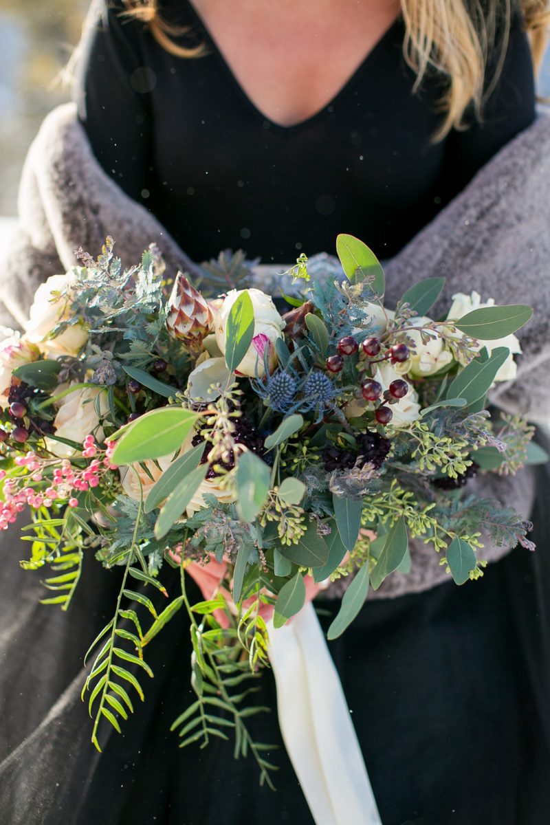 Don't miss the black gown and ski lift ride at this chilly wintry elopement 