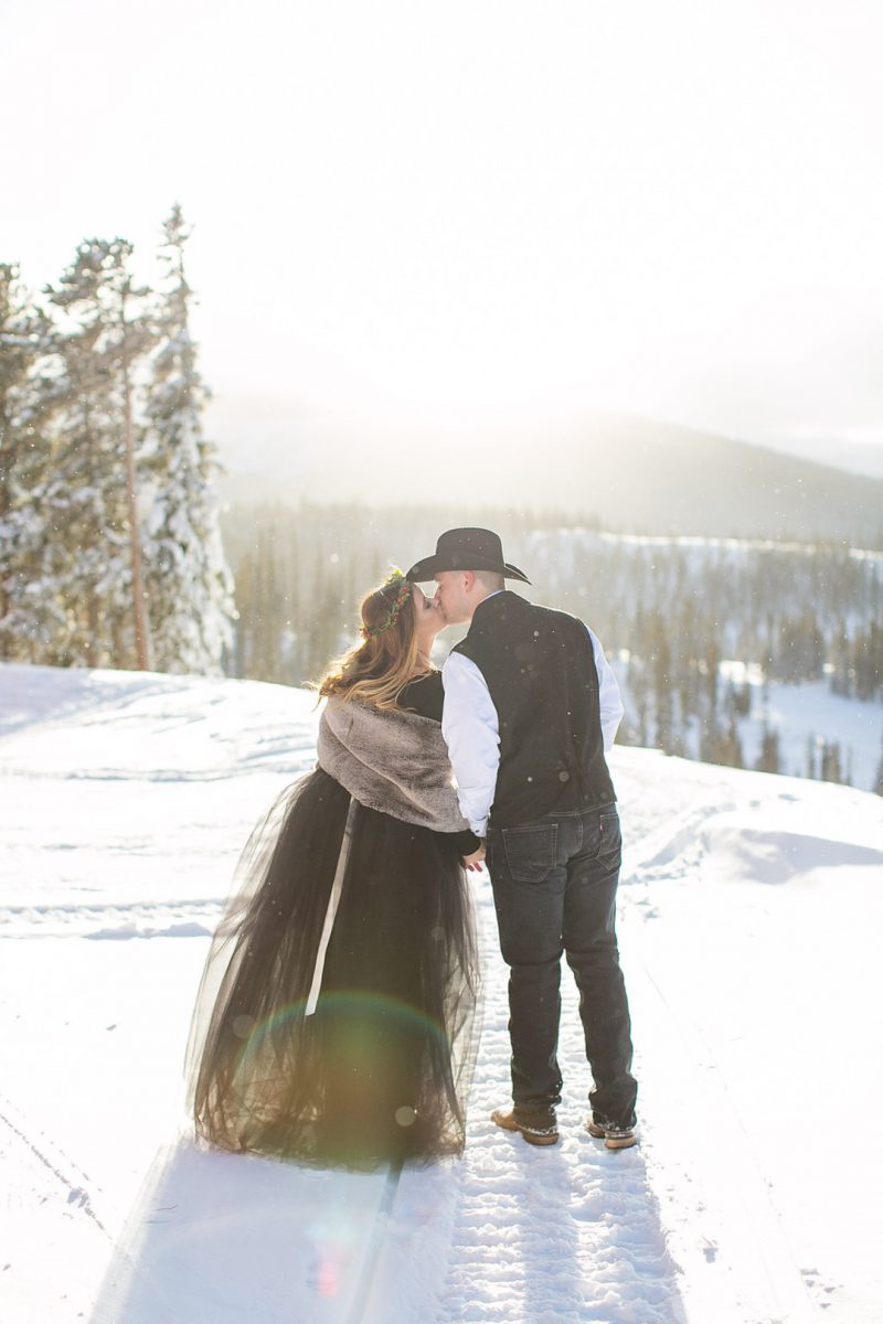Don't miss the black gown and ski lift ride at this chilly wintry elopement 