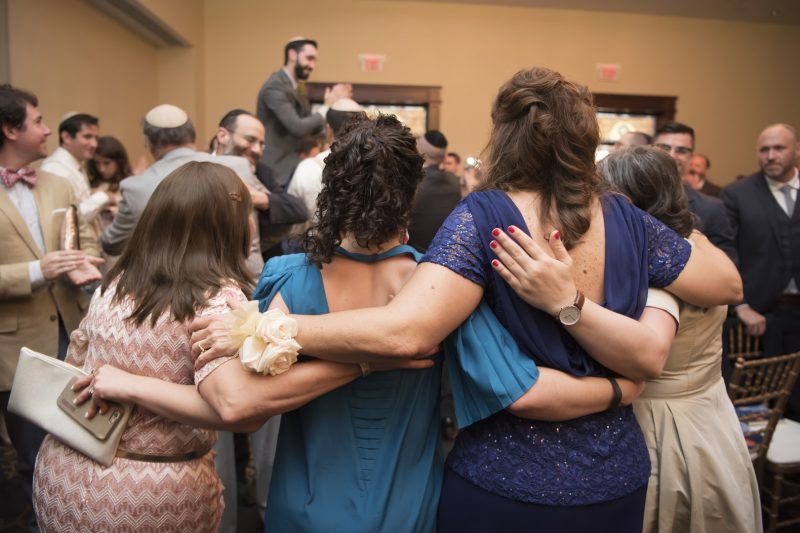 Board games, dance-offs, and inflatable unicorns: a traditional Jewish wedding with a twist