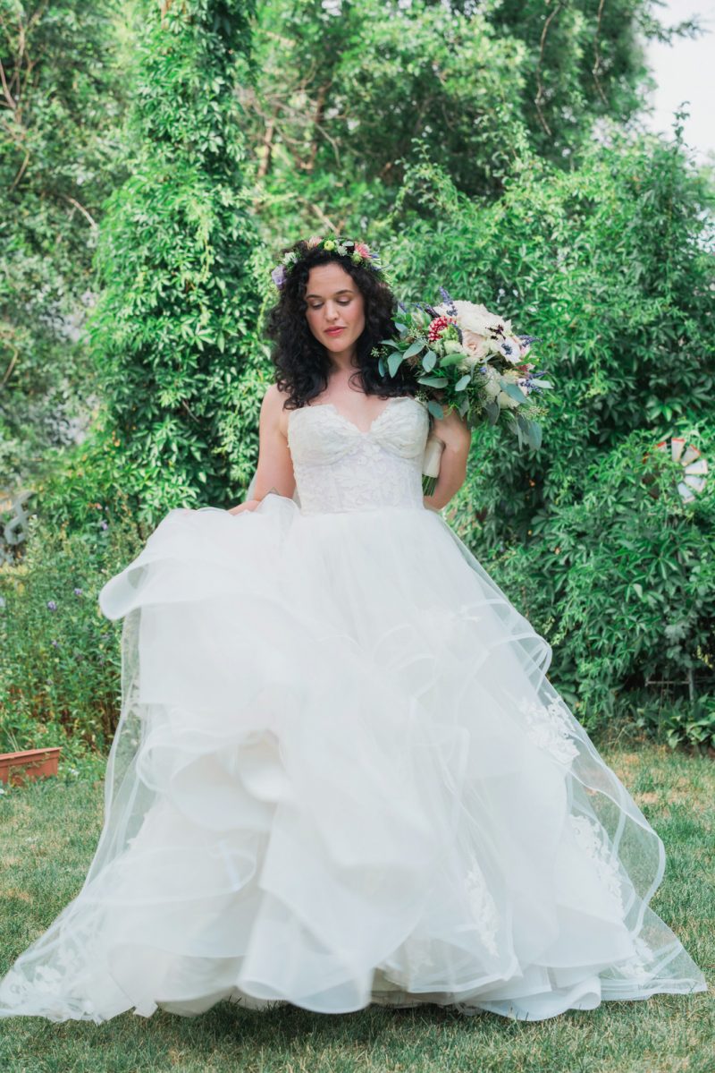 Don't miss the floral dresses, colorful art, and live band at this adorable Colorado wedding