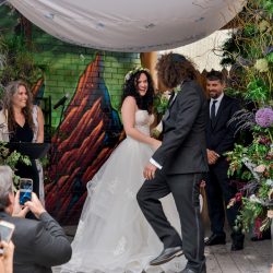 Niven Fairmain RebeccaMariePhotography RMP4882 big - Don't miss the floral dresses, colorful art, and live band at this adorable Colorado wedding Don't miss the floral dresses, colorful art, and live band at this adorable Colorado wedding