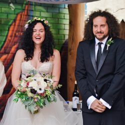 Niven Fairmain RebeccaMariePhotography RMP4897 big - Don't miss the floral dresses, colorful art, and live band at this adorable Colorado wedding Don't miss the floral dresses, colorful art, and live band at this adorable Colorado wedding